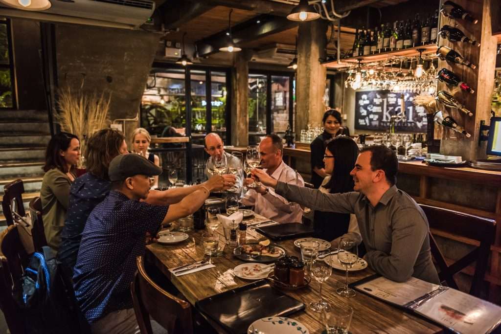 Guests enjoying seafood and BBQ at Kai New Zealand Bangkok